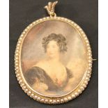 A 15CT GOLD PEARL SET PORTRAIT MINIATURE PENDANT/BROOCH of oval form, watercolours on paper,