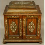 A 19TH CENTURY MOTHER-OF-PEARL INLAID ROSEWOOD JEWELLERY CABINET having a swept and moulded top, two