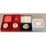 A GROUP OF FOUR HALCYON DAYS ENAMELLED BOXES each housed in the original box.  (4) CONDITION: Two