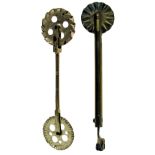 TWO 19TH/20TH CENTURY BRASS PASTRY JIGGERS, one with two pierced wheels, German, 11.5cm long, the