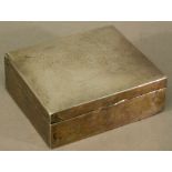 AN EARLY 20TH CENTURY SILVER MOUNTED CIGAR BOX of hinged square form, the slightly domed top with