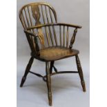 A 19TH CENTURY WINDSOR CHAIR of traditional form, with pierced central splat, bowed mid-rail an d
