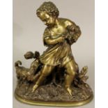 A FRENCH BRONZE FIGURE GROUP modelled as a child holding a puppy with a playful dog snappng at her