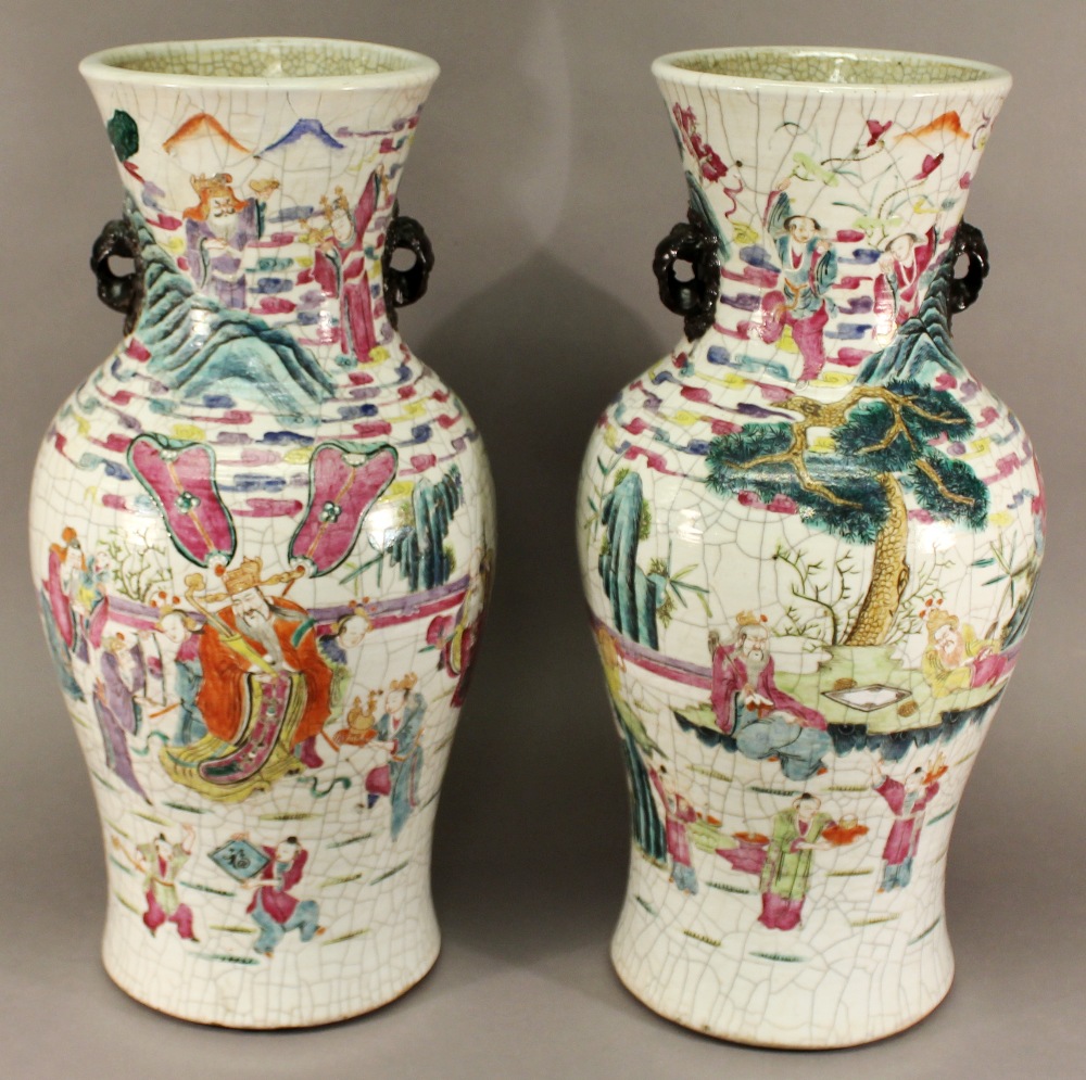 A PAIR OF CHINESE FAMILLE ROSE PORCELAIN CRACKLE WARE VASES with applied handles, each body - Image 2 of 6