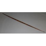 A PALMWOOD LONG BOW probably South Seas, of slender tapering form. 200cm(L) CONDITION: Slight losses