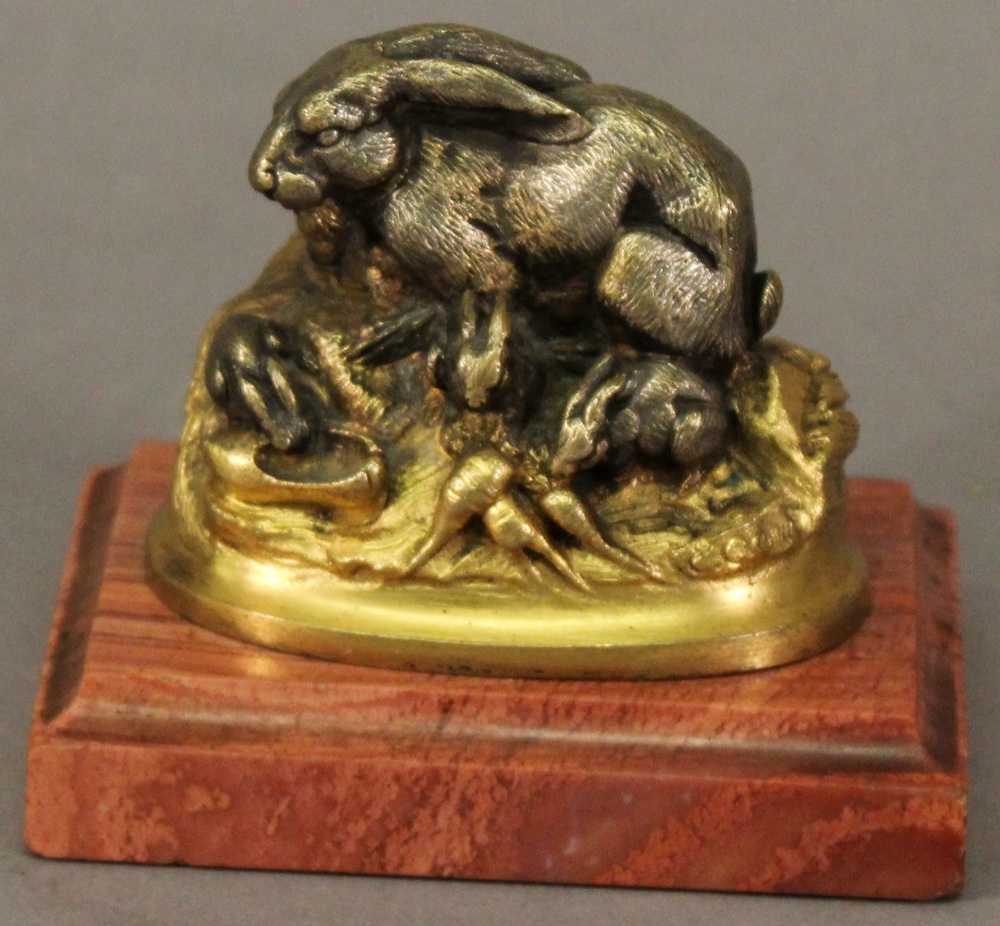 After LOUIS-EMILE CANA (1845-1895) A PARCEL-GILT METAL FIGURE GROUP of a rabbit and kits, bearing