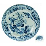 A LATE GEORGIAN SLIGHTLY LOBED STONE-CHINA PLATE, finely transfer-printed in underglaze blue with