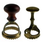 TWO PIEDMONTESE CIRCULAR PASTRY JIGGERS for the preparation of filled pasta, comprising a brass