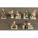 A GROUP OF SEVEN PEGGIE FOY POTTERY FIGURES depicting characters from Alice in Wonderland and