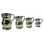 A GROUP OF FOUR RARE GRADUATED CAST-NICKEL BULBOUS MEASURES comprising a One pint engraved in