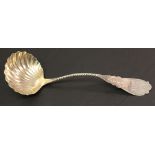 A SMALL GROUP OF AMERICAN STERLING AND WHITE METAL comprising a scalloped ladle with twisted stem