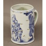 AN UNUSUAL CONTINENTAL DELFT TYPE STEIN, decorated with figures in foliate borders, incised mark
