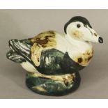 A ROYAL COPENHAGEN STONEWARE EIDER DUCK designed by Knud Kyhn, model number 21410, painted and