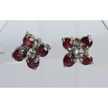 A PAIR OF SILVER, GARNET AND WHITE STONE EARRINGS (for pierced ears - stamped 925 to butterflies), a