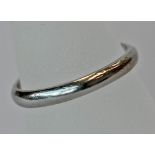 A PLATINUM WEDDING BAND of slender plain form, marked 'Platinum' ring size L, 3grams. CONDITION: