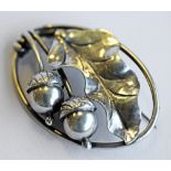 A GEORG JENSEN INC (USA) HAND-WROUGHT STERLING BROOCH, oval, with oak leaf and acorns, marked to the