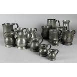 FOUR VICTORIAN PEWTER BULBOUS MEASURES - QUARTER GILL TO HALF PINT, 5cm, 6cm, 7.5cm and 10cm