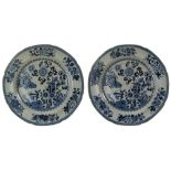 A PAIR OF LATE GEORGIAN STONE-CHINA PLATES transfer-printed in underglaze blue with chinoiserie