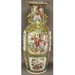 A CHINESE CANTON FAMILLE ROSE PORCELAIN VASE with everted rim and neck applied with gilt foo dogs