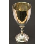 A GEORGE V SILVER 'PENRITH HOMING SOCIETY OLD BIRD AVERAGE' TROPHY of goblet-form with knopped