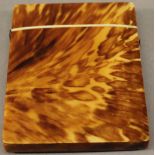 A VICTORIAN TORTOISESHELL CARD CASE of traditional form with well figured tortoiseshell veneer. 1.