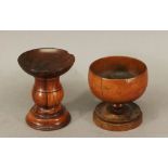 AN 18TH CENTURY TURNED LIGNUM VITAE SEARCE having a turned screw-off bowl with pierced grille and