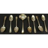 A GROUP OF EIGHT 19TH CENTURY SILVER SPOONS various dates and patterns, including a sauce ladle. (8)