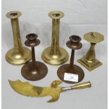 Pair of Brass Pusher Candlesticks and a Pair of Copper Candlesticks