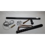 Police Officers Truncheon, an Asp, Handcuffs etc