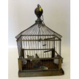 Bird cage and a clock under a dome. Condition report: see terms and conditions.