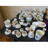 Approximately 65 pieces crested ware, Crown china harp (Llanelly) waterfall statue (Hull), Botol