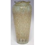 Vaseline glass vase possibly Webbs,   moulded with scrolls and strap work with floral bosses, mid-