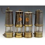 Three Richard Johnson Clapham Morris Ltd, Manchester, steel sleeved safety lamps, one named on the