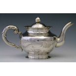 Chinese silver teapot, early 20th century, the body engraved with fenghuang and a lotus, diameter