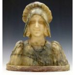 Marble and alabaster bust of a girl in a mop cap, on oval marble base, height 33cm..
 
Condition
