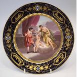 Vienna type plate signed Tadra,   painted with a classical scene, within raised gilt border, beehive