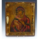 Russian Orthodox painted icon of the Madonna and child, 36 x 31cm.