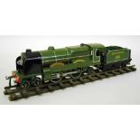 Hornby Series O gauge, a 20V 4-4-2 locomotive 'Lord Nelson' with tender in Southern green livery,