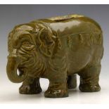 Stoneware censer in the form of an elephant, covered in green glaze (no lid), height 12.5cm.