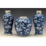 Pair of Chinese blue and white Kangxi style baluster vases and a similar ginger jar, each painted