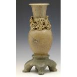 Chinese greyish soapstone vase carved with a dragon amongst clouds, height 30cm.