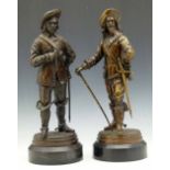 Pair of patinated bronze figures of King Charles I and Oliver Cromwell, on black marble bases,