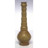 Martin Brothers vase circa 1878, with ribbed neck, impressed mark to base, 23cm high     Condition
