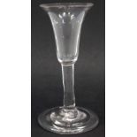 Gin glass circa 1750  with bell shaped bowl, plain stem and slightly raised folded foot, 12cm high