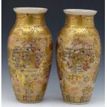 Large pair of Japanese Satsuma vases, late Meiji period, decorated in enamels and gilt with shaped