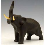 Japanese patinated bronze standing elephant with inset ivory tusks, seal mark, height 14cm.