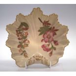 Royal Worcester shell dish  decorated with flora on an ivory ground, puce printed marks to base,