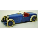 A Meccano No.1 touring car constructor set, in blue and cream with red seat, boat-tailed body,