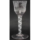 Wine glass   with ogee shaped bowl engraved with oriental figures set on opaque twist stem and