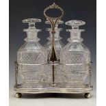 George III silver three bottle decanter stand, Emes & Barnard, London 1808, the trefoil weighted